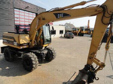 Колесный экскаватор Caterpillar M315